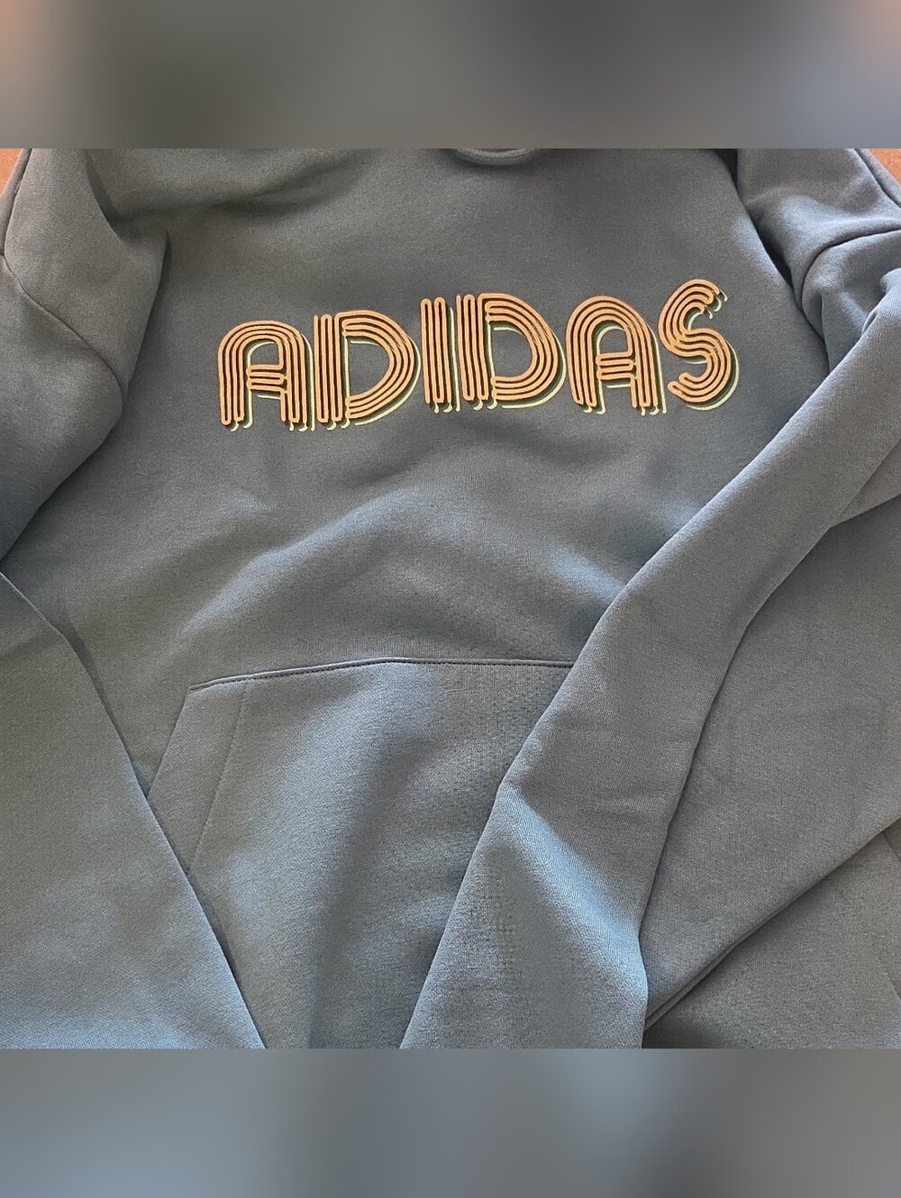 Adidas Blue Hoodie with Peach Logo